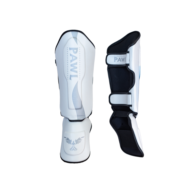 Canilleras MMA blancas y negras comparación de modelos para entrenamiento